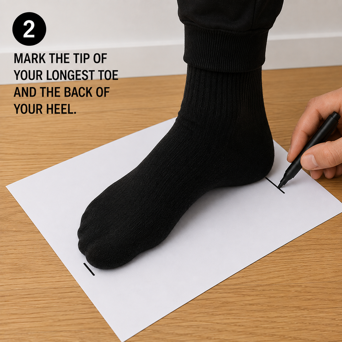 Mark the tip of your longest toe and the back of your heel.